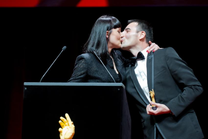 Maria and Richard Habring sharing a kiss on stage at the 2013 GPHG.