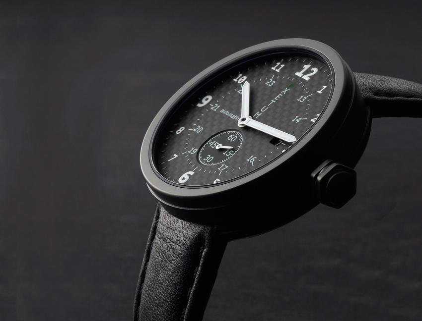 Xetum PVD Tyndall Carbon Fiber: Black PVD surgical stainless steel case and black naturally tanned leather strap with Italian cork lining