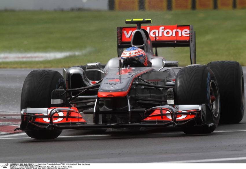 June 2011: Jenson Button driving a McLaren on the Gilles Villeneuve circuit in Montreal. 