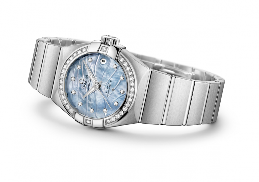 OMEGA Constellation “Pluma”, with blue mother-of-pearl dial, diamond-paved bezel, smooth stainless steel case and a matching bracelet.