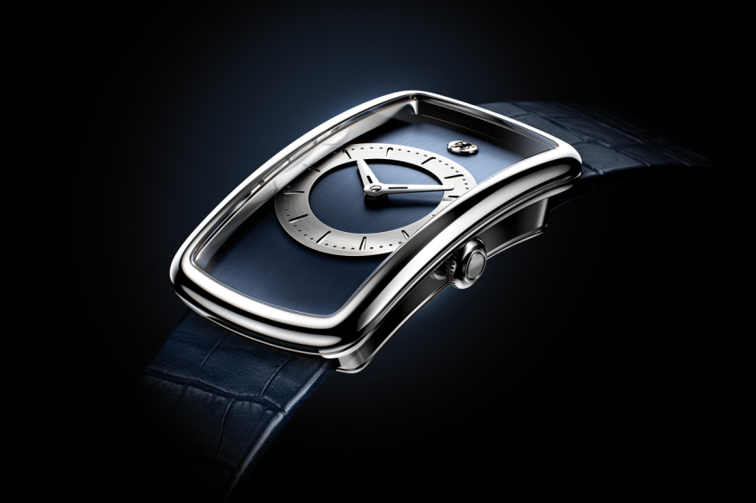 Curved shaped platinum case of the Badollet Ivresse is designed to embrace wrist.