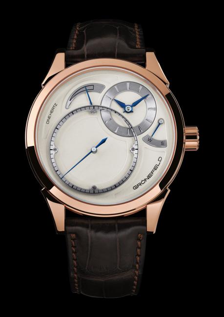 The Grönefeld One Hertz: red gold case, solid silver dial displaying hours and minutes, independent dead seconds and a power reserve indicator.