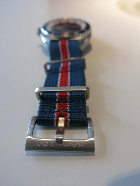 The buckle on the Pan Europ strap bears the Hamilton name engraved.