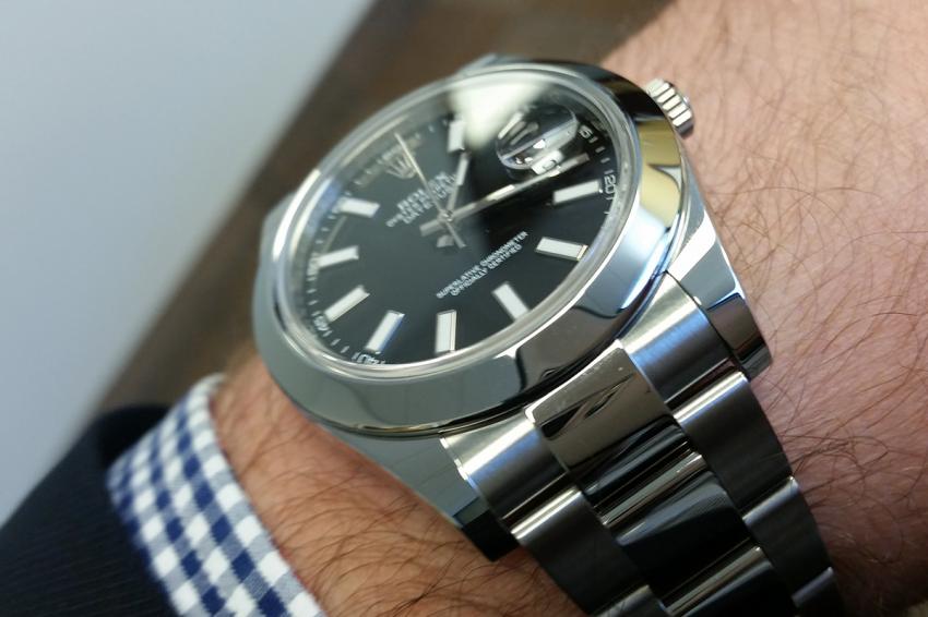 A black dial Rolex Datejust II on TimeCaptain's wrist.