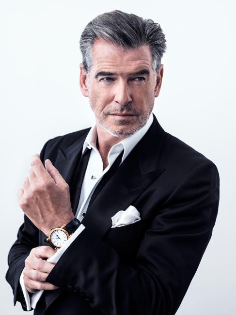 Piece Brosnan and his gold Speake-Marin Resilience.