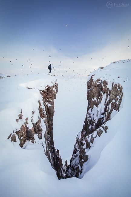 Self-portrait at King George Society Cliffs, Arctic Bay, Nunavut. Photo courtesy of Paul Zizka