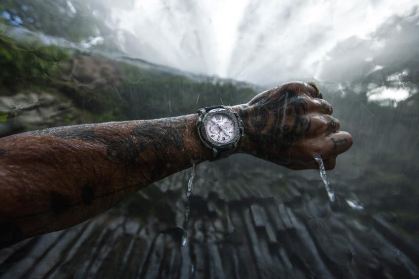 Chris Leidy with a Clerc Hydroscaph Chrono under a waterfall in Queensland, Australia.