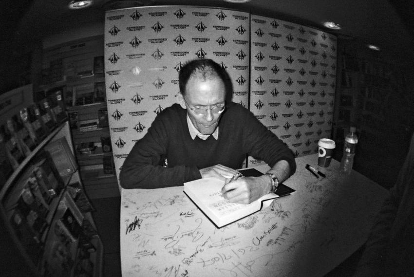 William Gibson signing a copy of his novel Zero History at Forbidden Planet in London on October 20, 2010.