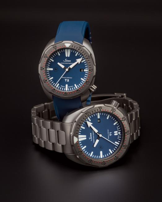 The new Sinn T2 B (standing) and the bigger T1 B