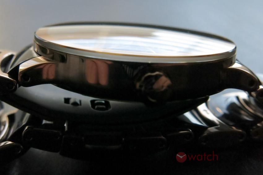 The slightly domed sapphire crystal of the Rado Centrix Automatic Open Heart