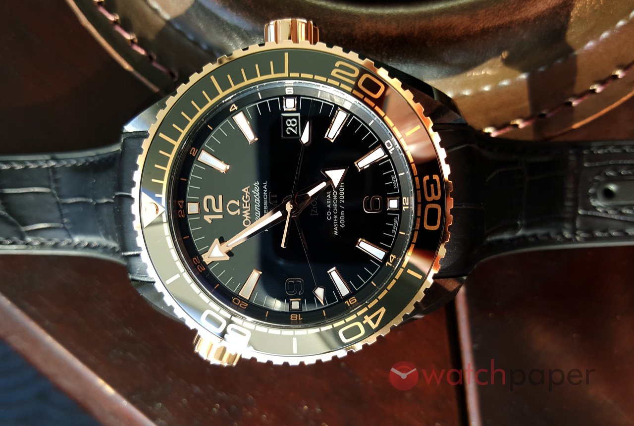 omega deep black gold