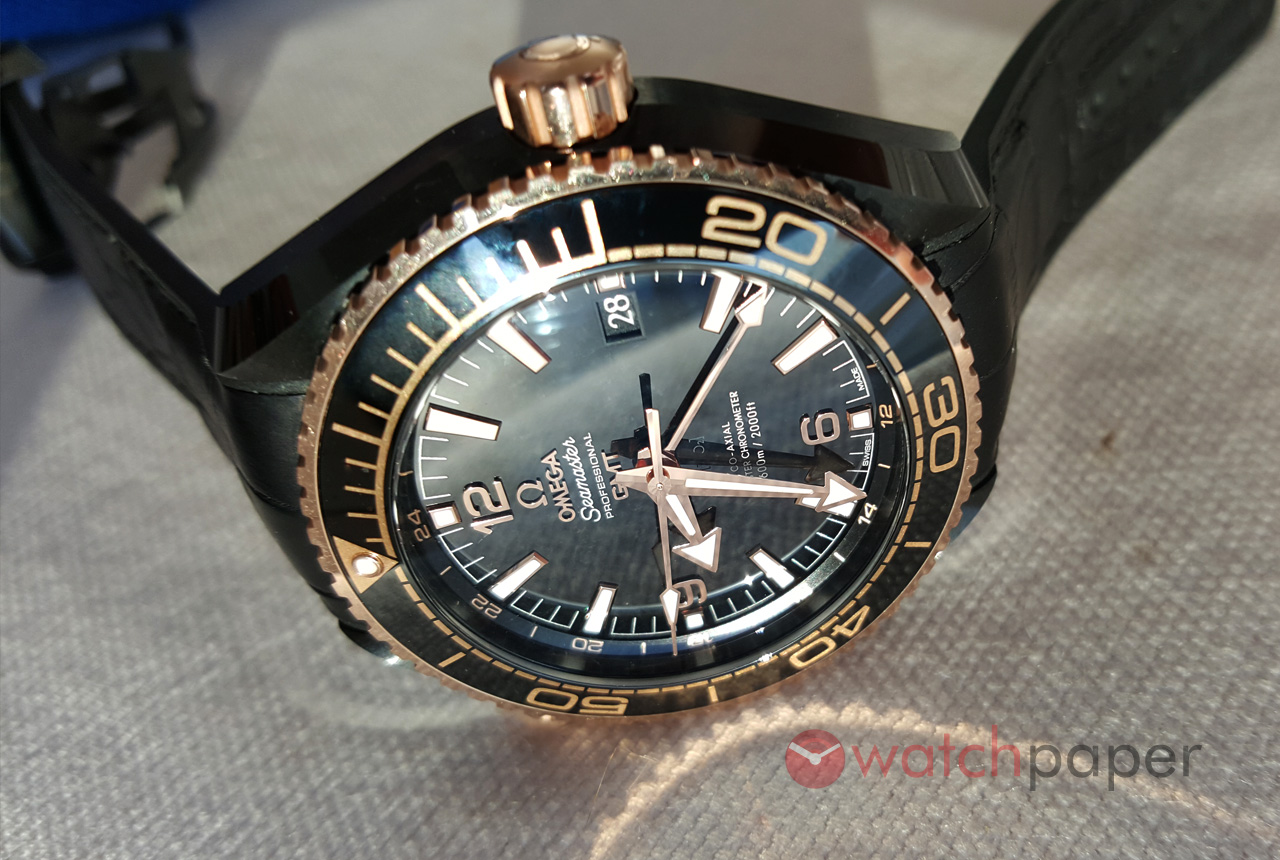 omega deep black gold